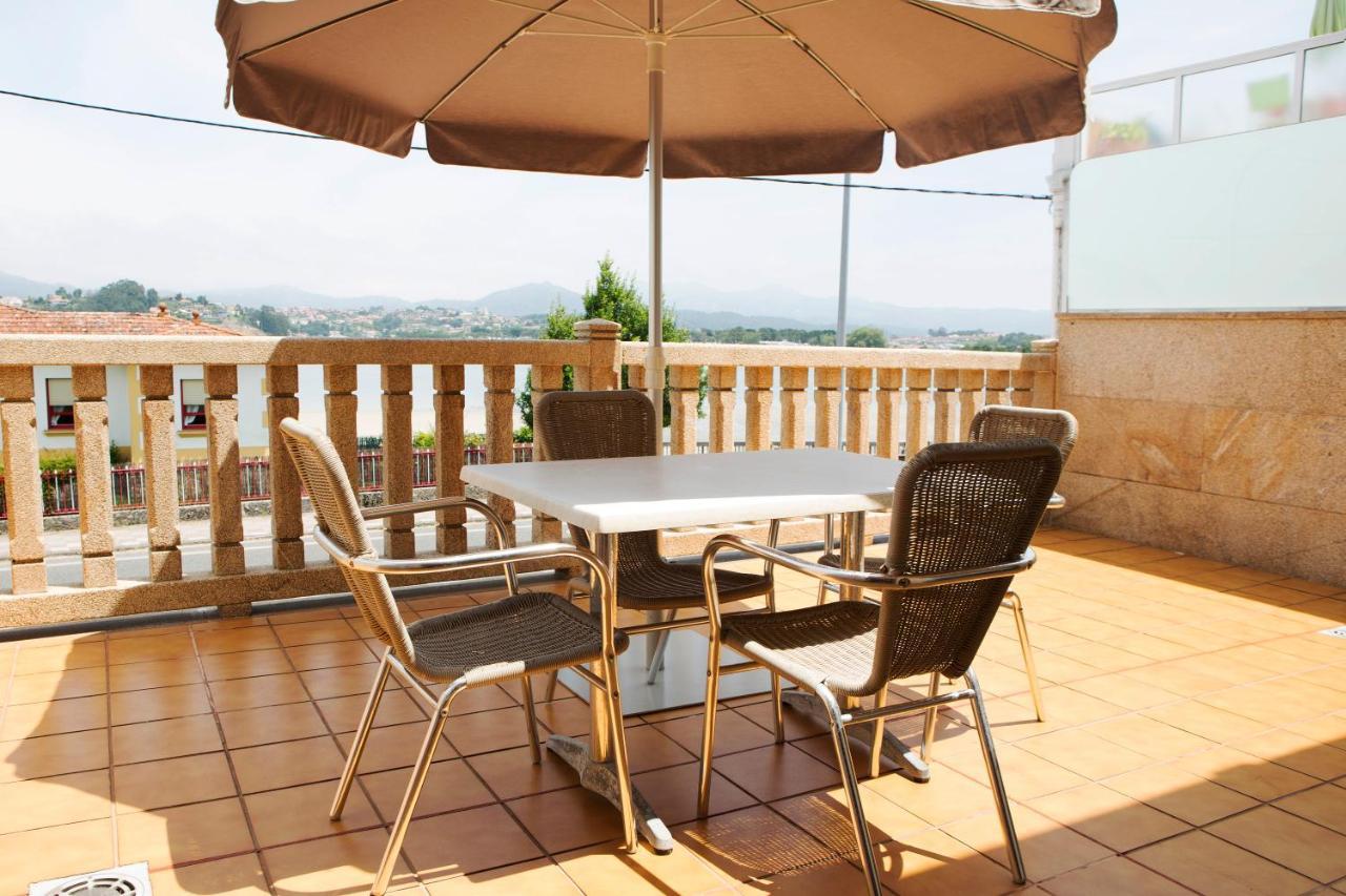 Apartamentos Ria De Bayona Baiona Buitenkant foto