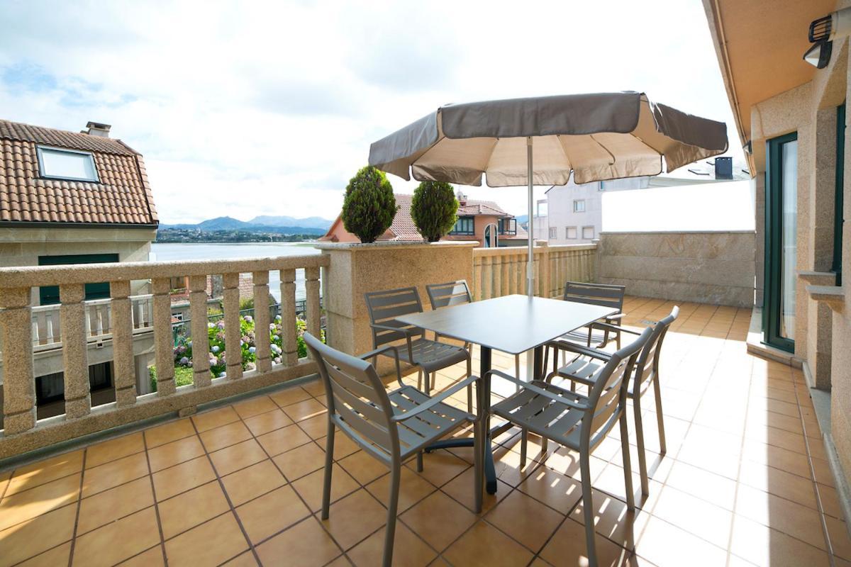 Apartamentos Ria De Bayona Baiona Buitenkant foto